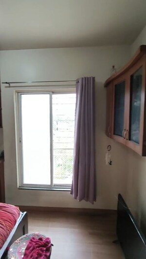 Bedroom in 3 BHK Apartment at Zircon Ventures CHS Ltd, Viman Nagar – for Rent