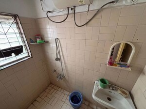 Bathroom in 1 BHK Apartment at Shahenshah CHS, Koregaon Park – for Rent