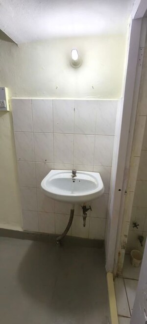 Bathroom in 1 BHK Apartment at Ragvilas Society – for Rent
