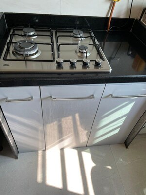 Kitchen in 1 BHK Apartment at Sheth Vasant Oasis Camelia, Andheri East – for Rent