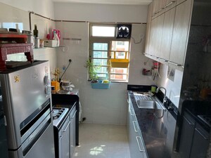 Kitchen in 1 BHK Apartment at Sheth Vasant Oasis Camelia, Andheri East – for Rent