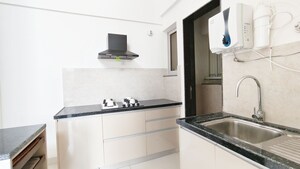 Kitchen in 2 BHK Builder Floor at Gera Planet Of Joy, Kharadi – for Sale