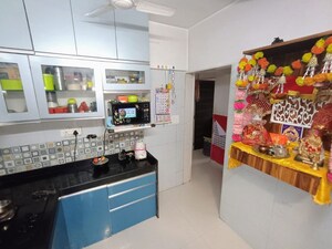 Kitchen in 2 BHK Apartment at Madhu Platina, Mira Road – for Sale