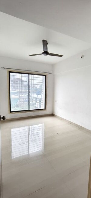 Bedroom in 2 BHK Apartment at Pradnyaraj Lotus, Wadgaon Sheri – for Rent