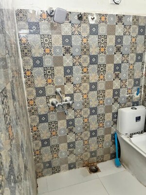 Bathroom in 1 RK Apartment at Gaur Atulyam, Omicron I Greater Noida – for Rent