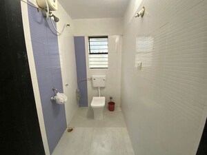 Bathroom in 2 BHK Apartment at Surabhi Height, Dhanori – for Rent