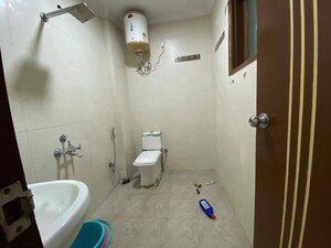 Bathroom in 3 BHK Apartment at Chattarpur – for Rent