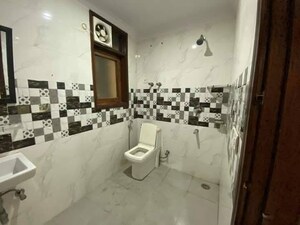 Bathroom in 3 BHK Apartment at Chattarpur – for Rent