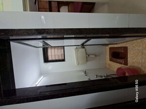 Kitchen in 1 BHK Apartment at Panchayatan CHS, Borivali West – for Rent