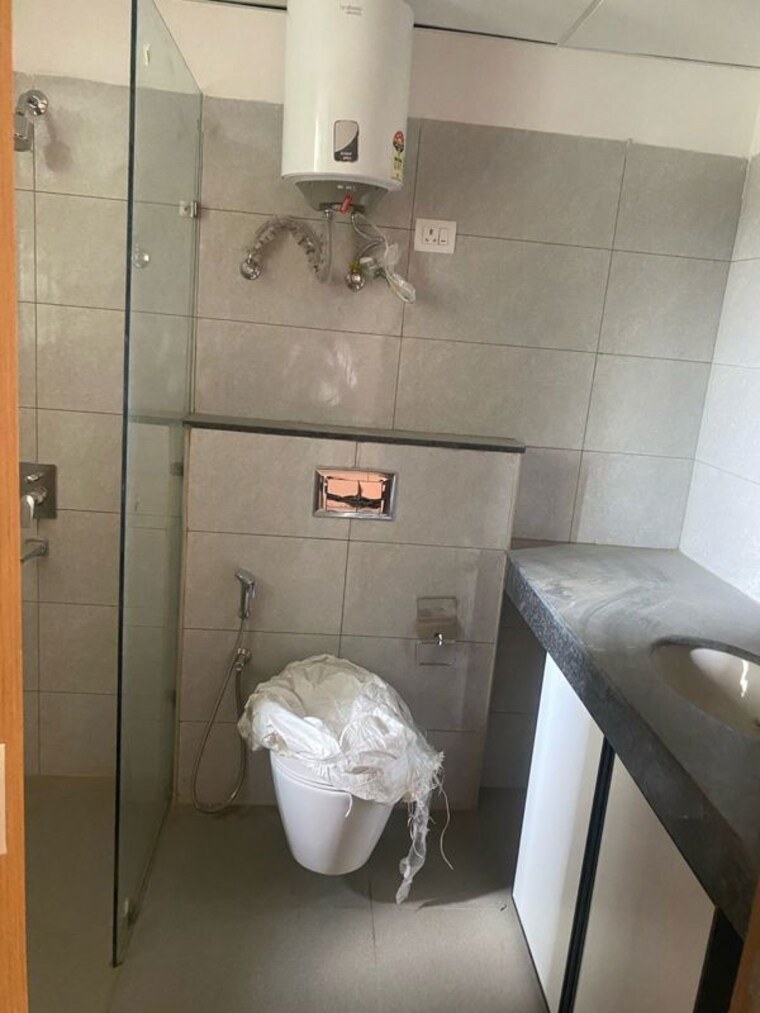 Bathroom, godrej-woods 2 Bedroom 1255 Sq.Ft. Apartment In Sector 43 Noida 10525368
