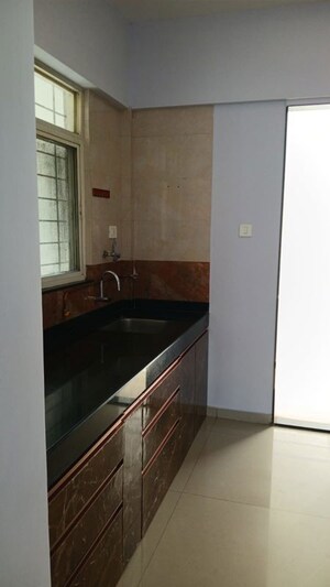 Kitchen in 2 BHK Apartment at GRACIA CHS, Kharadi – for Rent