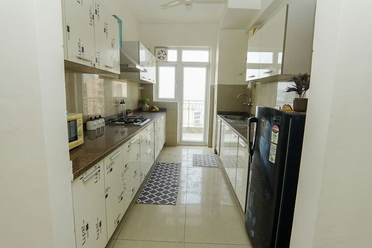 Kitchen, emaar-palm-gardens 3 Bedroom 1900 Sq.Ft. Apartment In Sector 83 Gurgaon 10525394