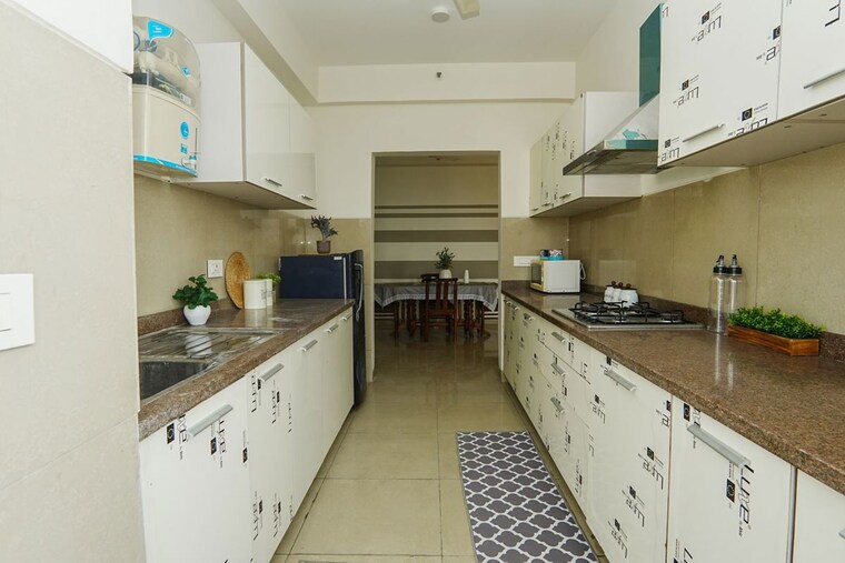 Kitchen, emaar-palm-gardens 3 Bedroom 1900 Sq.Ft. Apartment In Sector 83 Gurgaon 10525394