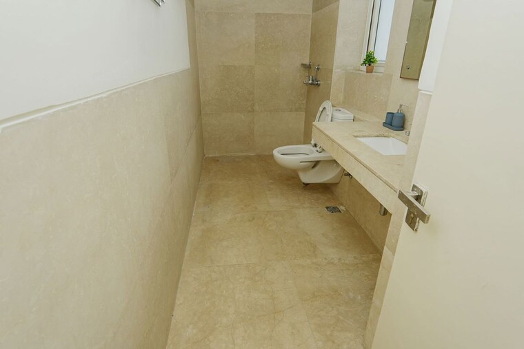 Bathroom, emaar-palm-gardens 3 Bedroom 1900 Sq.Ft. Apartment In Sector 83 Gurgaon 10525394