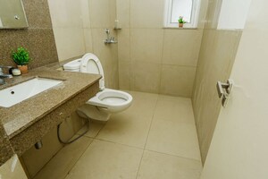 Bathroom in 3 BHK Apartment at Emaar Palm Gardens, Sector 83 – for Sale