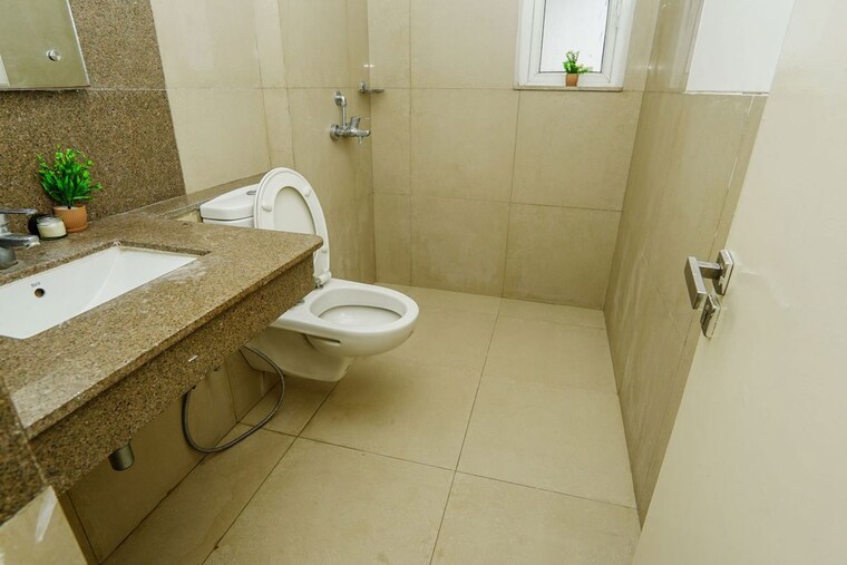 Bathroom, emaar-palm-gardens 3 Bedroom 1900 Sq.Ft. Apartment In Sector 83 Gurgaon 10525394