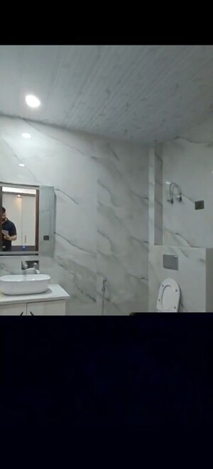 Bathroom in 4 BHK Builder Floor at Niti Khand – for Sale