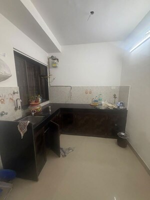 Kitchen in 1.5 BHK Apartment at Runwal Garden City, Balkum Pada – for Rent