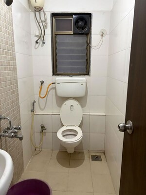 Bathroom in 1.5 BHK Apartment at Runwal Garden City, Balkum Pada – for Rent