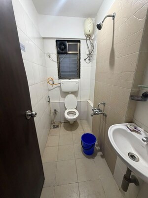 Bathroom in 1.5 BHK Apartment at Runwal Garden City, Balkum Pada – for Rent