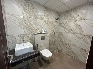 Bathroom in 3 BHK Apartment at Motia Blue Ridge, Dhakoli – for Sale