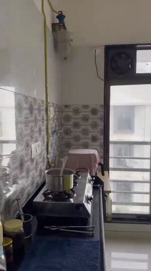 Kitchen in 1 BHK Apartment at Sanghvi S3 Ecocity Spring, Mira Road – for Rent