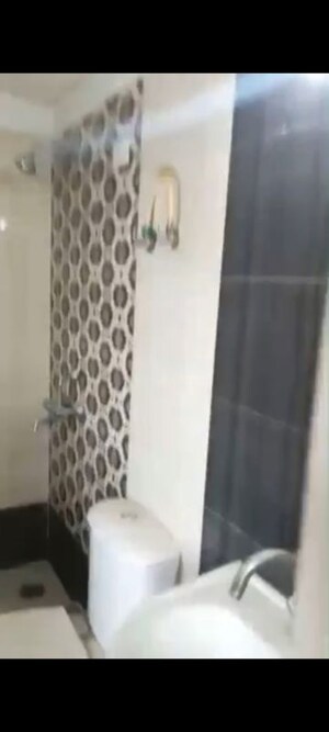 Bathroom in 2 BHK Apartment at Proview Officer City 2, Raj Nagar Extension – for Rent