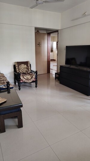 Living Room in 2 BHK Apartment at Magarpatta Sylvania, Hadapsar – for Sale