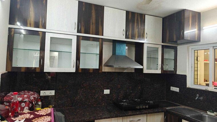 Kitchen, theme-ambience-golf-view 2 Bedroom 1450 Sq.Ft. Apartment In Gachibowli Hyderabad 10525524