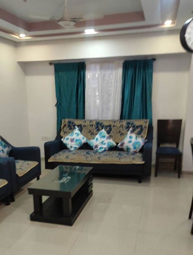 Living Room, mount-n-glory 2 Bedroom 1100 Sq.Ft. Apartment In Kharadi Pune 10525606