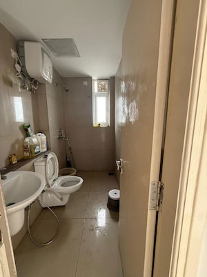 Bathroom in 3.5 BHK Apartment at Emaar Palm Gardens, Sector 83 – for Rent