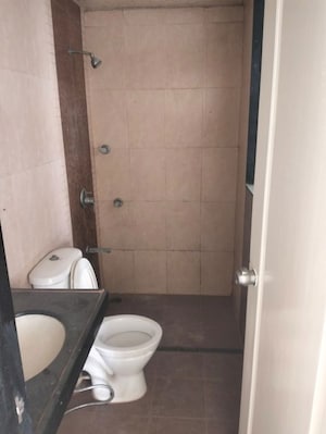Bathroom in 2 BHK Apartment at Rama Celestial City, Ravet – for Rent
