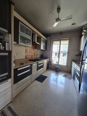 Kitchen in 3 BHK Apartment at Sheth Vasant Lawns, Laxmi Nagar – for Rent