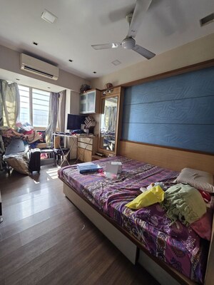 Bedroom in 3 BHK Apartment at Sheth Vasant Lawns, Laxmi Nagar – for Rent