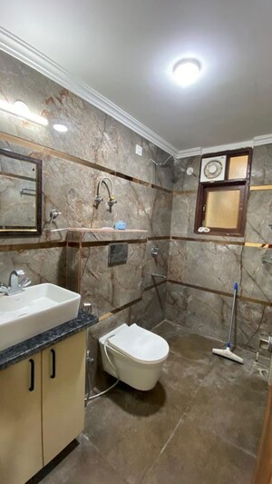 Bathroom in 3 BHK Builder Floor at Chattarpur – for Rent