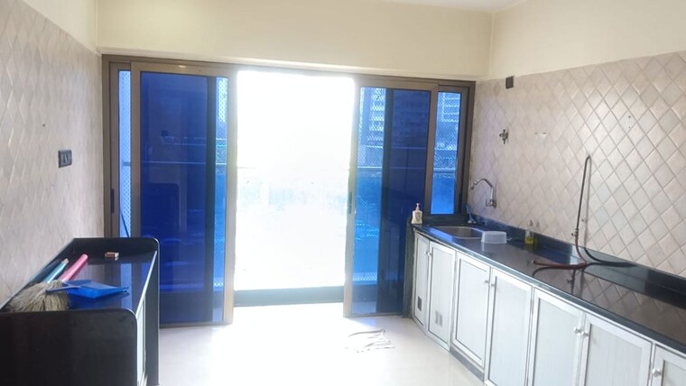 Kitchen, rna-azzure 3 Bedroom 2100 Sq.Ft. Apartment In Bandra East Mumbai 10514392