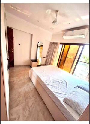 Bedroom in 2 BHK Apartment at Svarna Rosemary, Mahim West – for Rent