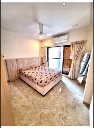 Bedroom in 2 BHK Apartment at Svarna Rosemary, Mahim West – for Rent