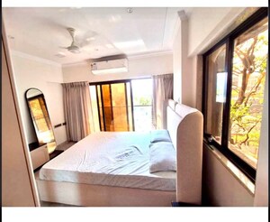 Bedroom in 2 BHK Apartment at Svarna Rosemary, Mahim West – for Rent