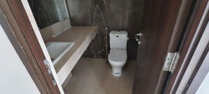 Bathroom in 3 BHK Apartment at Godrej Aqua, International Airport Road – for Rent