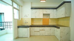 Kitchen in 2 BHK Apartment at Ajnara Gen X, Dundahera – for Sale