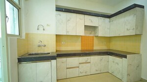 Kitchen in 2 BHK Apartment at Ajnara Gen X, Dundahera – for Sale