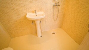Bathroom in 2 BHK Apartment at Ajnara Gen X, Dundahera – for Sale