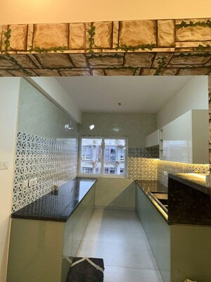 Kitchen in 3 BHK Apartment at Bhartiya Nikoo Homes Phase 2, Thanisandra Main Road – for Rent