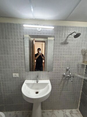 Bathroom in 2 BHK Apartment at Unnati Fortune The Aranya, Sector 119 – for Rent
