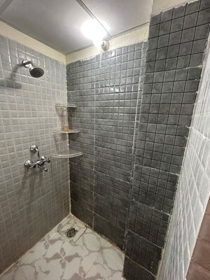 Bathroom in 2 BHK Apartment at Unnati Fortune The Aranya, Sector 119 – for Rent