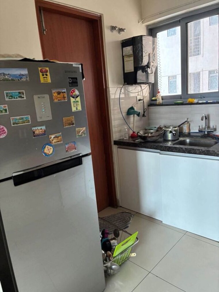 Kitchen, kumar-paradise-pune 2 Bedroom 800 Sq.Ft. Apartment In Magarpatta City Pune 10526053