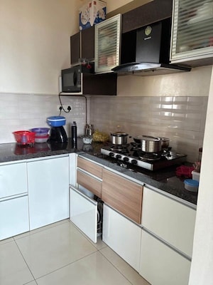 Kitchen in 2 BHK Apartment at Kumar Paradise Pune, Magarpatta City – for Sale