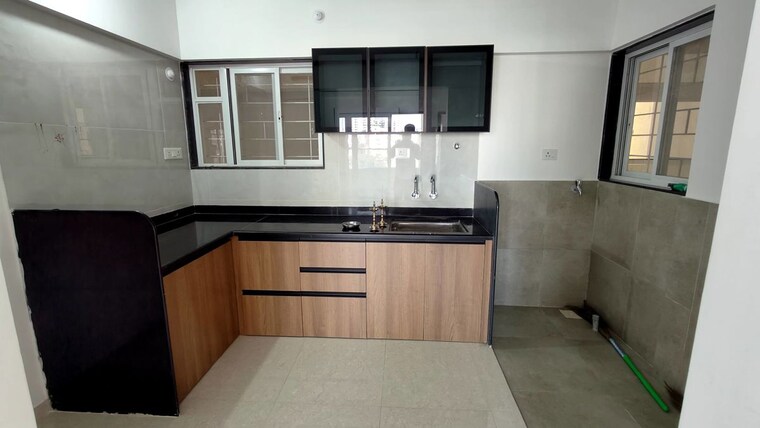 Kitchen, sukhwani-skylines 2 Bedroom 756 Sq.Ft. Apartment In Wakad Pune 10526086
