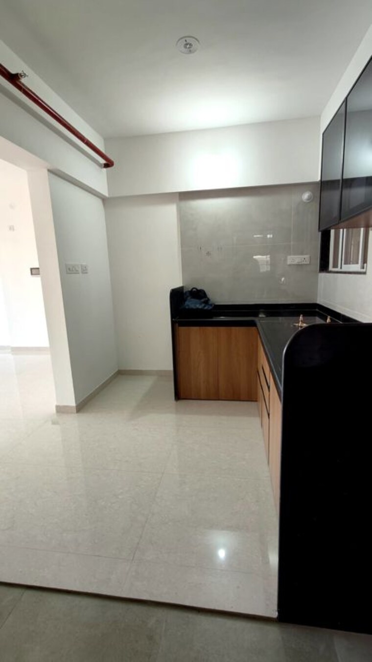 Kitchen, sukhwani-skylines 2 Bedroom 756 Sq.Ft. Apartment In Wakad Pune 10526086